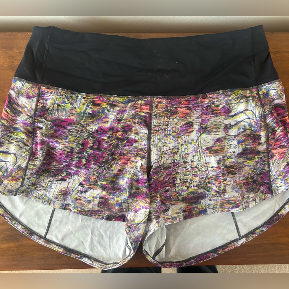 Speed Up Mid-Rise Shorts 4”